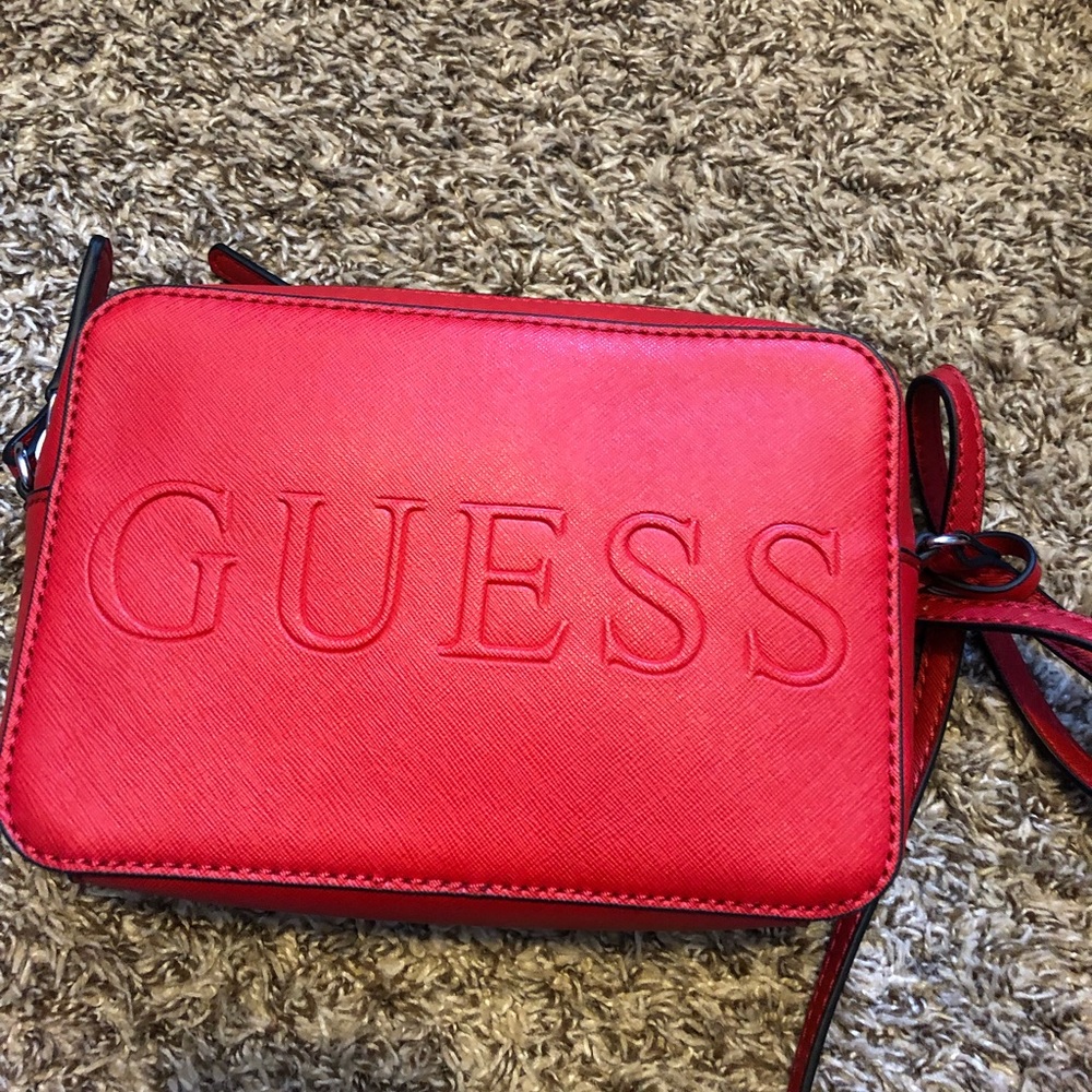 red guess bag